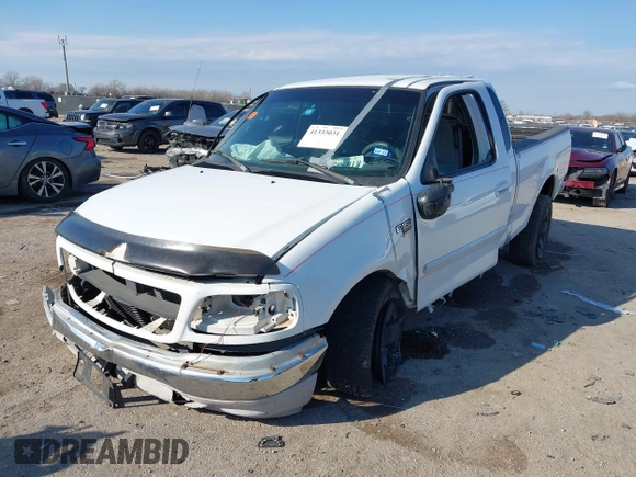 1999 Ford F-150 XL with VIN 1FTRX17L0XKB96416, listed as a IAAI auction lot 41333031 with Not Provided miles. Bid and sale history available at carsss.com. Image 18.