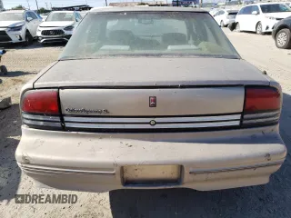1997 Oldsmobile Cutlass Supreme S z VIN 1G3WH52M1VF353626, wystawiony jako Copart lot #63069534 z przebiegiem 62 841 mil mil oraz Szkody całkowita. Historia ofert i sprzedaży dostępna na DreamBid. Obrazek 6.