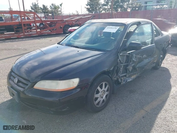 2002 Honda Accord Sdn SE with VIN 1HGCG66872A136407, listed as a IAAI auction lot 41681336 with 232,200 mi miles. Bid and sale history available at carsss.com. Image 2.