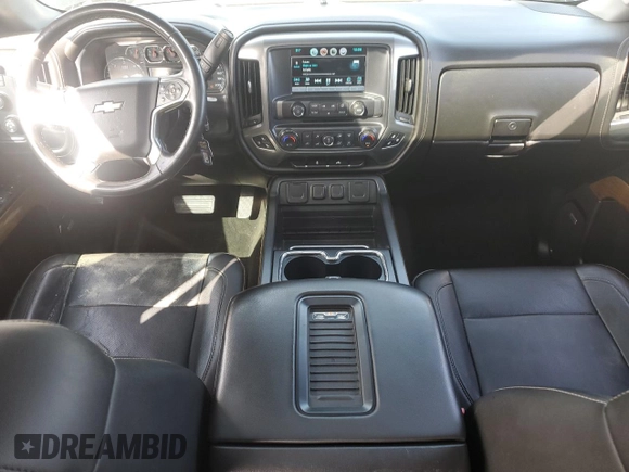 2017 Chevrolet Silverado 1500 LTZ with VIN 3GCUKSEJ9HG491930, listed as a Copart auction lot 51223025 with 128,251 mi miles and Salvage Title. Bid and sale history available at DreamBid. Image 8.