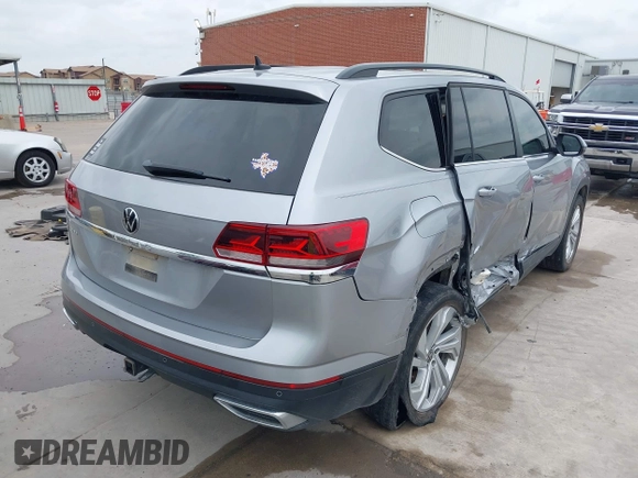 2021 Volkswagen Atlas SE с VIN 1V2JR2CA2MC539992, выставлен на аукционе IAAI как лот 42133933 с пробегом 82 287 миль миль и . История ставок и продаж доступна на DreamBid. Изображение 4.