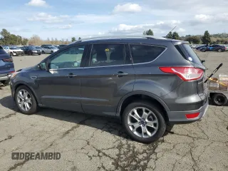 2015 Ford Escape Titanium with VIN 1FMCU0J98FUA46879, listed as a Copart auction lot 51173555 with 72,093 mi miles and Salvage Title. Bid and sale history available at DreamBid. Image 2.