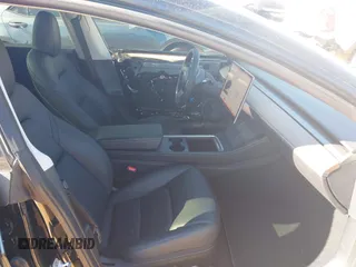 2023 Tesla Model 3 Long Range with VIN 5YJ3E1EB6PF634116, listed as a IAAI auction lot 41814670 with 47,801 mi miles and . Bid and sale history available at DreamBid. Image 5.
