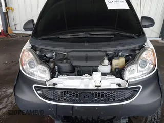 2014 Smart fortwo Pure z VIN WMEEJ3BA4EK737709, wystawiony jako IAAI lot #42105265 z przebiegiem 23 970 mil mil oraz . Historia ofert i sprzedaży dostępna na DreamBid. Obrazek 10.