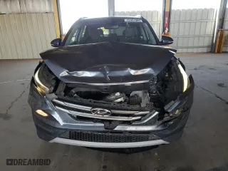 2018 Hyundai Tucson Value with VIN KM8J33A23JU823248, listed as a Copart auction lot 42967005 with 107,295 mi miles and Salvage Title. Bid and sale history available at carsss.com. Image 5.