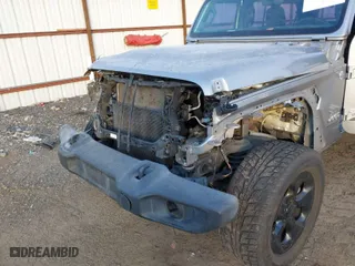 2018 Jeep Wrangler Unlimited Sport S with VIN 1C4HJXDG1JW183052, listed as a IAAI auction lot 41372557 with 56,076 mi miles. Bid and sale history available at carsss.com. Image 6.