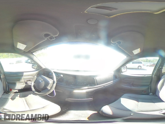 2010 Ford Police Interceptor with VIN 2FABP7BV7AX140870, listed as a Copart auction lot 53457275 with 124,194 mi miles and Salvage title. Bid and sale history available at DreamBid. Image 12.
