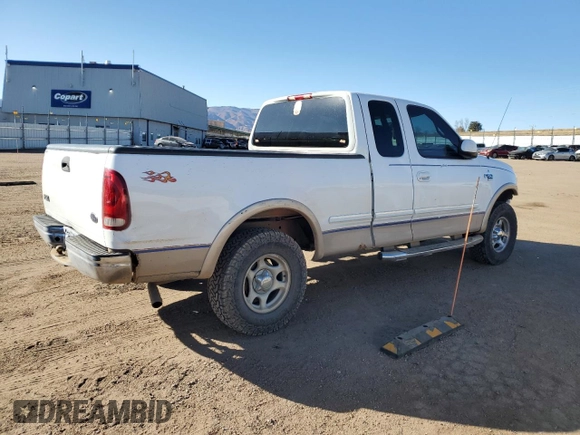 1998 Ford F-150 with VIN 1FTZX18W3WNA25682, listed as a Copart auction lot 47494755 with 197,389 mi miles and Salvage title. Bid and sale history available at DreamBid. Image 3.