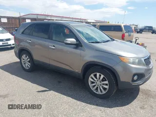 2011 Kia Sorento EX with VIN 5XYKUDA29BG010219, listed as a IAAI auction lot 42106579 with 233,350 mi miles. Bid and sale history available at carsss.com. Image 1.