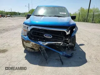 2021 Ford F-150 XL with VIN 1FTFW1E50MFA32128, listed as a Copart auction lot 56423385 with 88,965 mi miles and Salvage title. Bid and sale history available at DreamBid. Image 14.