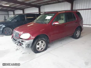 2003 Mercedes-Benz M-Class 3.7L with VIN 4JGAB57E13A448528, listed as a IAAI auction lot 41953003 with 256,637 mi miles. Bid and sale history available at carsss.com. Image 2.
