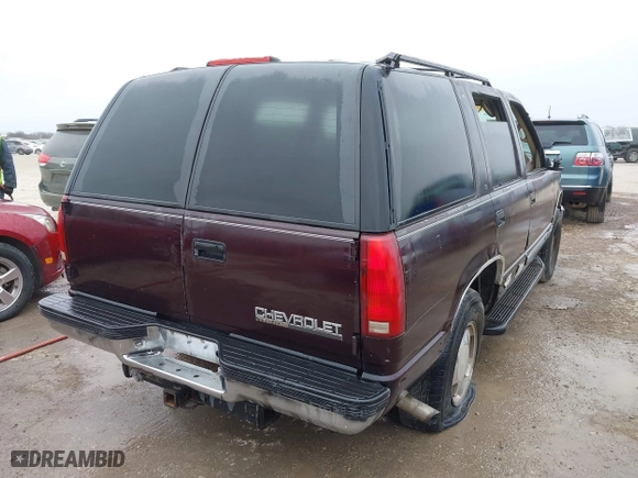 1997 Chevrolet Tahoe with VIN 1GNEK13R8VJ329165, listed as a IAAI auction lot 41631672 with 166,976 mi miles. Bid and sale history available at carsss.com. Image 4.