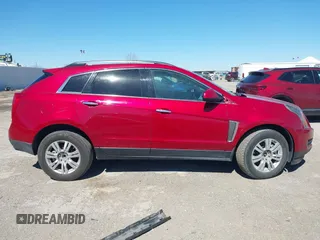 2014 Cadillac SRX with VIN 3GYFNAE36ES597007, listed as a IAAI auction lot 41675527 with 105,613 mi miles and . Bid and sale history available at DreamBid. Image 13.