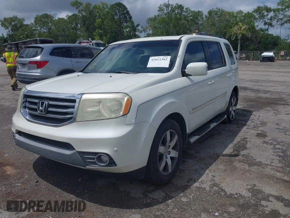 2012 Honda Pilot Touring with VIN 5FNYF3H9XCB035494, listed as a IAAI auction lot 42011362 with 271,887 mi miles and . Bid and sale history available at carsss.com. Image 12.