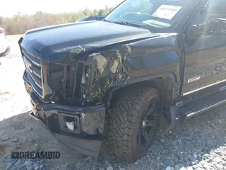 2015 GMC Sierra 1500 SLT with VIN 3GTU2VEJ8FG318480, listed as a IAAI auction lot 42075388 with 143,156 mi miles and . Bid and sale history available at DreamBid. Image 6.