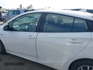 2022 Toyota Prius L Eco z VIN JTDKAMFU6N3177732, wystawiony jako IAAI lot #42504790 z przebiegiem 65 338 mil mil oraz . Historia ofert i sprzedaży dostępna na DreamBid. Obrazek 14.
