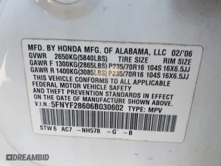 2006 Honda Pilot EX-L with RES with VIN 5FNYF28606B030602, listed as a IAAI auction lot 41392868 with 227,782 mi miles. Bid and sale history available at carsss.com. Image 9.