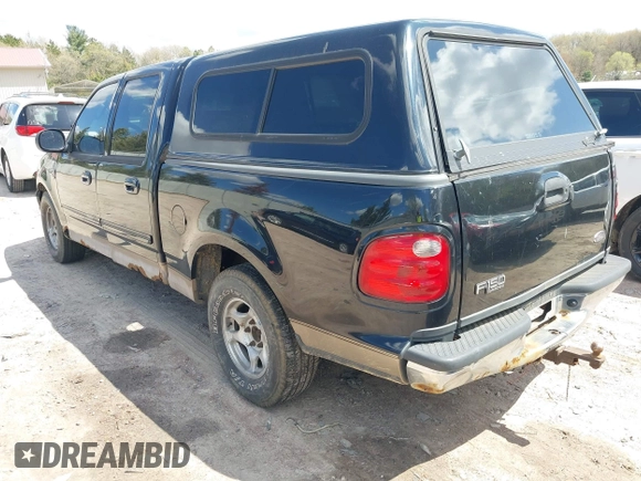 2003 Ford F-150 XLT with VIN 1FTRW07613KC71609, listed as a IAAI auction lot 42186741 with 190,591 mi miles. Bid and sale history available at carsss.com. Image 3.