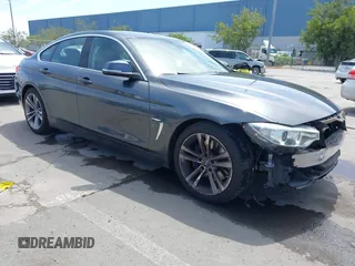 2015 BMW 4 Series 428i with VIN WBA4A5C59FGK15750, listed as a IAAI auction lot 42098856 with 62,530 mi miles and . Bid and sale history available at carsss.com. Image 1.
