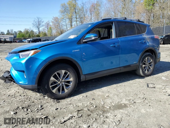 2016 Toyota RAV4 Hybrid XLE with VIN JTMRJREV4GD003211, listed as a Copart auction lot 52111305 with 79,404 mi miles and Salvage Title. Bid and sale history available at carsss.com. Image 1.