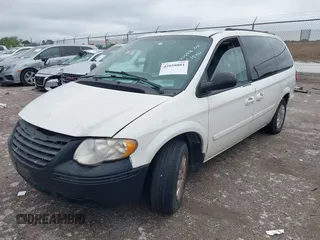 2005 Chrysler Town & Country LX with VIN 2C4GP44RX5R590022, listed as a IAAI auction lot 42058881 with 191,272 mi miles and . Bid and sale history available at DreamBid. Image 2.