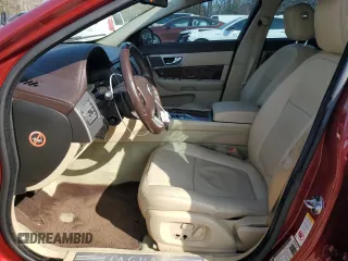 2010 Jaguar XF Premium Luxury with VIN SAJWA0GB9ALR77234, listed as a Copart auction lot 48592735 with 141,164 mi miles and Salvage Title. Bid and sale history available at carsss.com. Image 7.