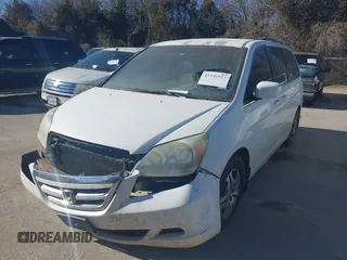 2006 Honda Odyssey EX with VIN 5FNRL38426B400952, listed as a IAAI auction lot 41346853 with 210,826 mi miles and . Bid and sale history available at DreamBid. Image 2.