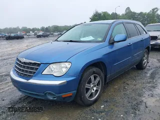 2007 Chrysler Pacifica Touring z VIN 2A8GM68X87R164399, wystawiony jako IAAI lot #42363682 z przebiegiem 158 445 mil mil oraz . Historia ofert i sprzedaży dostępna na DreamBid. Obrazek 2.