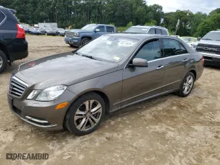 2011 Mercedes-Benz E-Class E 550 Luxury with VIN WDDHF9AB1BA385318, listed as a Copart auction lot 66115634 with 197,595 mi miles and Salvage Title. Bid and sale history available at carsss.com. Image 1.