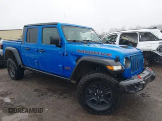 2022 Jeep Gladiator Mojave with VIN 1C6JJTEG1NL128530, listed as a IAAI auction lot 41111344 with 56,119 mi miles and . Bid and sale history available at DreamBid. Image 1.