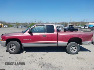 1999 Dodge Dakota SLT z VIN 1B7GL22X2XS222162, wystawiony jako IAAI lot #42038943 z przebiegiem 222 883 mil mil oraz . Historia ofert i sprzedaży dostępna na DreamBid. Obrazek 13.