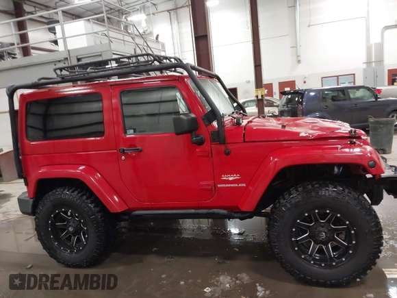 2011 Jeep Wrangler Sahara with VIN 1J4AA5D10BL593534, listed as a IAAI auction lot 41551416 with 101,716 mi miles and . Bid and sale history available at DreamBid. Image 13.