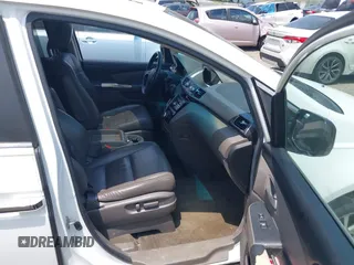 2012 Honda Odyssey EX-L with VIN 5FNRL5H63CB063684, listed as a IAAI auction lot 42576742 with 170,656 mi miles and . Bid and sale history available at DreamBid. Image 5.