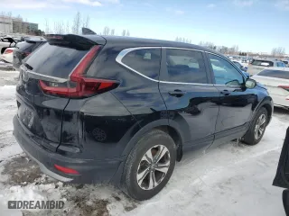 2021 Honda CR-V LX with VIN 2HKRW1H2XMH002297, listed as a Copart auction lot 44989105 with 80,057 mi miles and Salvage Title. Bid and sale history available at carsss.com. Image 3.