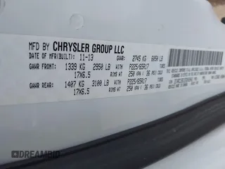 2014 Chrysler Town & Country Touring with VIN 2C4RC1BG1ER242842, listed as a IAAI auction lot 42043861 with 102,448 mi miles. Bid and sale history available at carsss.com. Image 9.