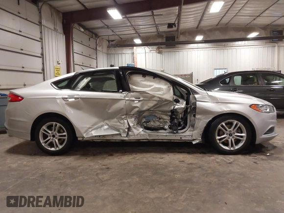 2018 Ford Fusion SE with VIN 3FA6P0HD1JR243112, listed as a IAAI auction lot 42256676 with 112,003 mi miles and . Bid and sale history available at DreamBid. Image 14.