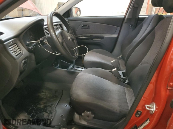 2010 Kia Rio with VIN KNADH4B39A6691792, listed as a Copart auction lot 80043064 with 161,139 mi miles and Salvage Title. Bid and sale history available at DreamBid. Image 7.