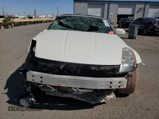 2005 Nissan 350Z Touring z VIN JN1AZ36A15M754779, wystawiony jako Copart lot #52346015 z przebiegiem Nie podano mil oraz Szkoda całkowita • Salvage title. Historia ofert i sprzedaży dostępna na DreamBid. Obrazek 5.