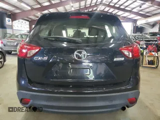 2014 Mazda CX-5 Sport с VIN JM3KE2BE0E0367493, выставлен на аукционе Copart как лот 57324195 с пробегом 103 367 миль миль и Списание • Salvage title. История ставок и продаж доступна на DreamBid. Изображение 6.