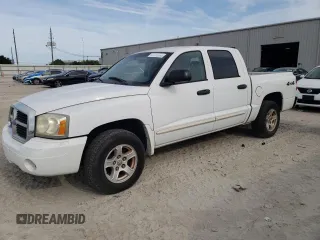 2005 Dodge Dakota SLT z VIN 1D7HW48N15S366026, wystawiony jako Copart lot #55510125 z przebiegiem 66 963 mil mil oraz Tytuł czysty. Historia ofert i sprzedaży dostępna na DreamBid. Obrazek 1.