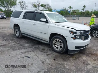 2015 Chevrolet Suburban LT z VIN 1GNSCJKC1FR539087, wystawiony jako IAAI lot #42423960 z przebiegiem 102 820 mil mil oraz . Historia ofert i sprzedaży dostępna na DreamBid. Obrazek 1.