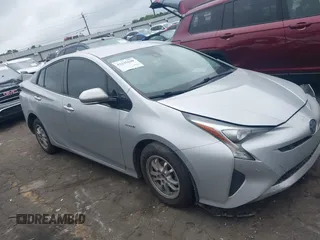 2018 Toyota Prius Two z VIN JTDKARFU6J3057288, wystawiony jako IAAI lot #42145640 z przebiegiem 191 789 mil mil oraz . Historia ofert i sprzedaży dostępna na DreamBid. Obrazek 1.