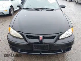 2004 Pontiac Grand Am GT with VIN 1G2NW52E64M677552, listed as a IAAI auction lot 41101595 with 100,644 mi miles. Bid and sale history available at carsss.com. Image 6.