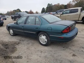 1997 Chevrolet Lumina LS with VIN 2G1WL52M3V9163567, listed as a Copart auction lot 82772324 with 191,852 mi miles and Salvage Title. Bid and sale history available at DreamBid. Image 2.