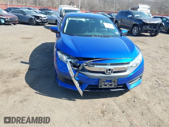 2017 Honda Civic LX z VIN 19XFC2F54HE203525, wystawiony jako IAAI lot #41796081 z przebiegiem 82 910 mil mil oraz . Historia ofert i sprzedaży dostępna na DreamBid. Obrazek 6.