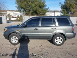 2007 Honda Pilot LX with VIN 2HKYF18197H504905, listed as a IAAI auction lot 41293667 with 200,448 mi miles. Bid and sale history available at carsss.com. Image 14.