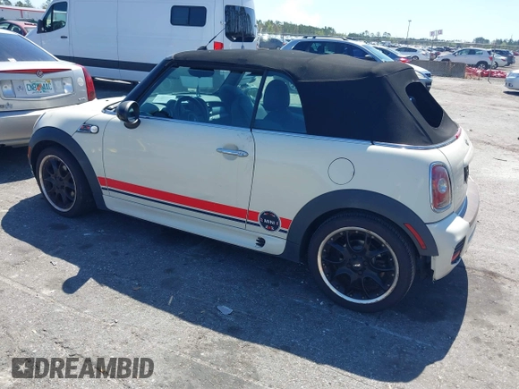 2010 MINI Convertible S with VIN WMWMS3C57ATY51245, listed as a IAAI auction lot 41802174 with 110,154 mi miles and . Bid and sale history available at DreamBid. Image 3.