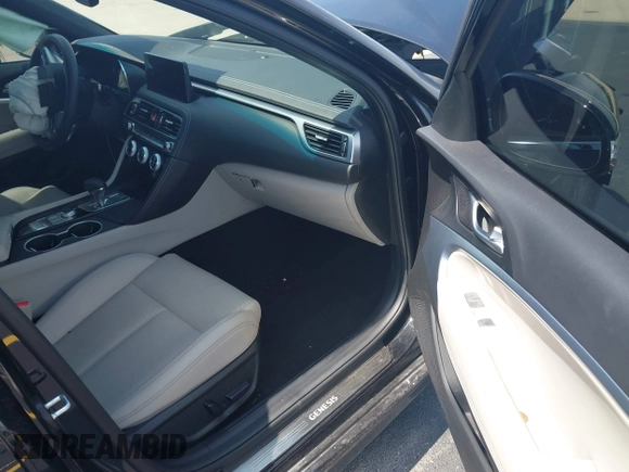 2023 Genesis G70 2.0T z VIN KMTG34TA4PU135164, wystawiony jako IAAI lot #42209723 z przebiegiem 14 251 mil mil oraz . Historia ofert i sprzedaży dostępna na DreamBid. Obrazek 5.