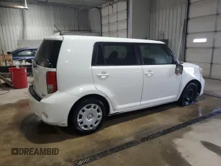 2011 Scion xB z VIN JTLZE4FE6B1125993, wystawiony jako Copart lot #53336335 z przebiegiem 229 378 mil mil oraz Szkoda całkowita • Salvage title. Historia ofert i sprzedaży dostępna na DreamBid. Obrazek 3.