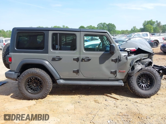 2019 Jeep Wrangler Unlimited Sport S with VIN 1C4HJXDG3KW662946, listed as a IAAI auction lot 42157025 with 26,096 mi miles and . Bid and sale history available at DreamBid. Image 12.